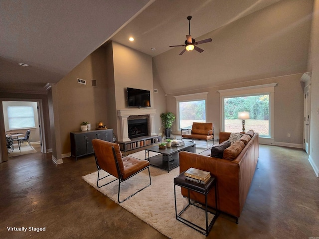 living room featuring ceiling fan and high vaulted ceiling