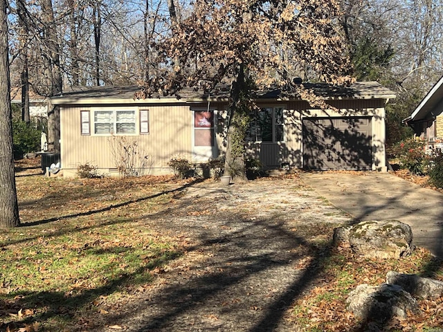 view of side of home with a garage