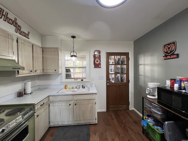 kitchen featuring exhaust hood, sink, hanging light fixtures, electric range, and dark hardwood / wood-style floors