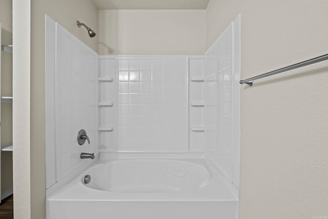 bathroom with tub / shower combination