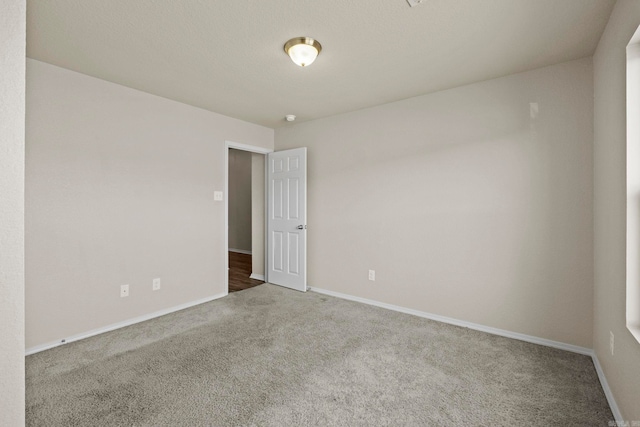 spare room with carpet