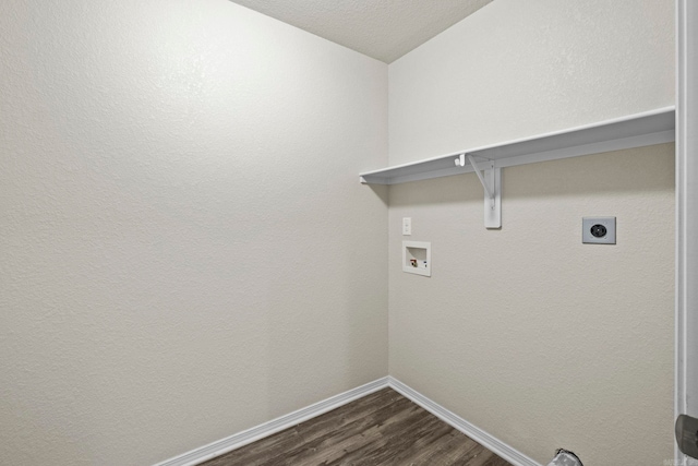 washroom with hookup for a washing machine, dark hardwood / wood-style flooring, and electric dryer hookup