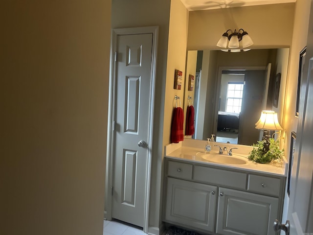 bathroom with tile patterned flooring and vanity