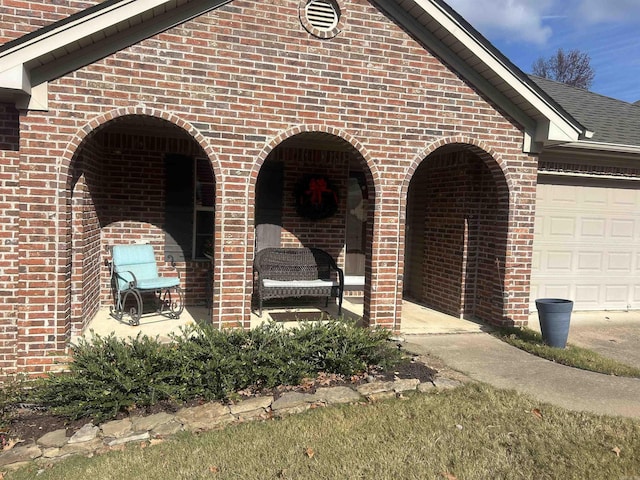 view of patio with a garage