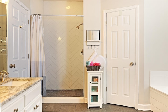 bathroom with tile patterned flooring, vanity, and separate shower and tub