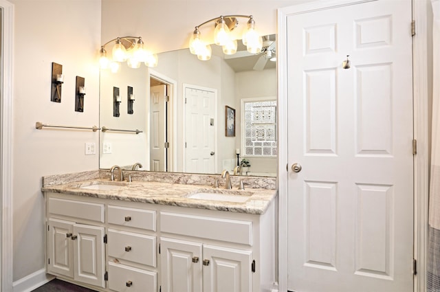 bathroom with vanity and ceiling fan