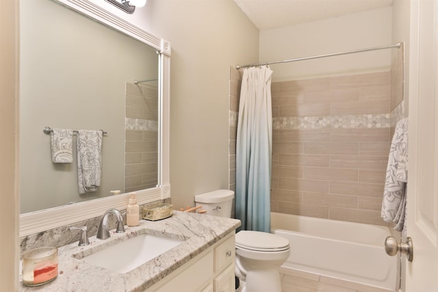 full bathroom with vanity, toilet, and shower / bath combo with shower curtain