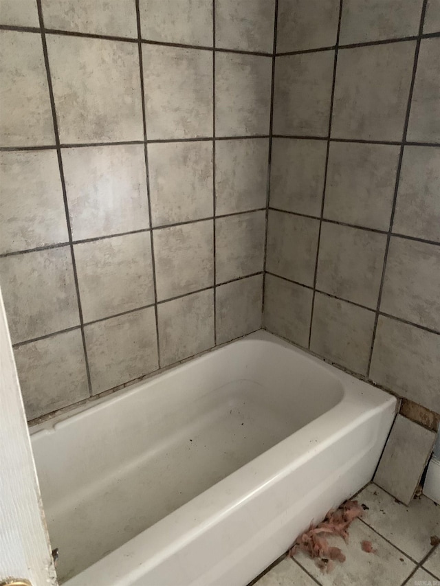 bathroom featuring a tub to relax in