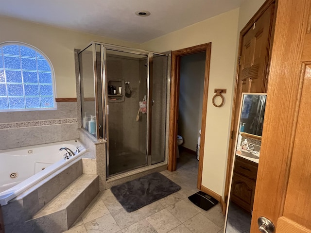 full bathroom featuring toilet, vanity, separate shower and tub, and tile patterned flooring