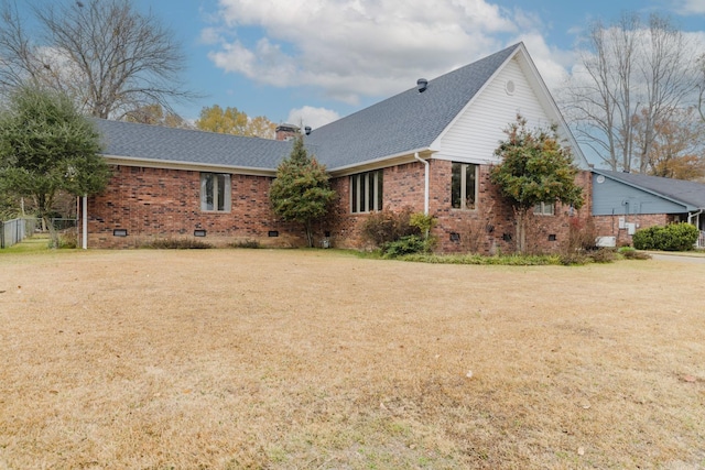 exterior space featuring a front lawn