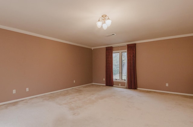 empty room with a notable chandelier, carpet flooring, and crown molding