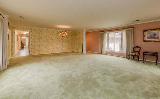 empty room featuring carpet floors and crown molding