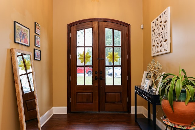 foyer featuring french doors and dark hardwood / wood-style floors