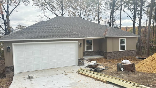 view of front of property with a garage