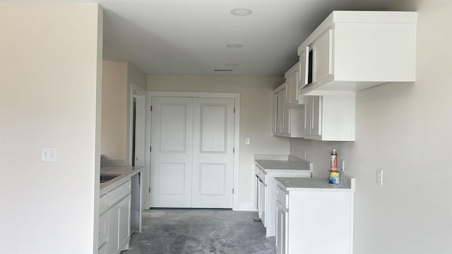 kitchen with white cabinets