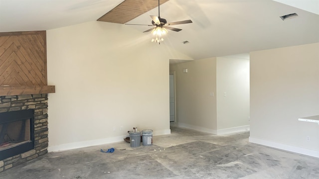 unfurnished living room featuring ceiling fan, a fireplace, and vaulted ceiling