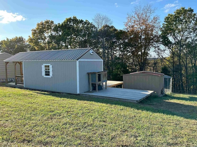 view of outdoor structure with a lawn