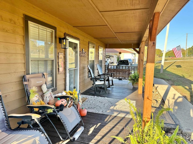 view of patio featuring a porch