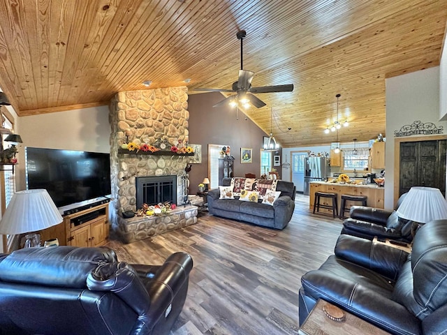 living room with ceiling fan, wood-type flooring, high vaulted ceiling, wooden ceiling, and a fireplace