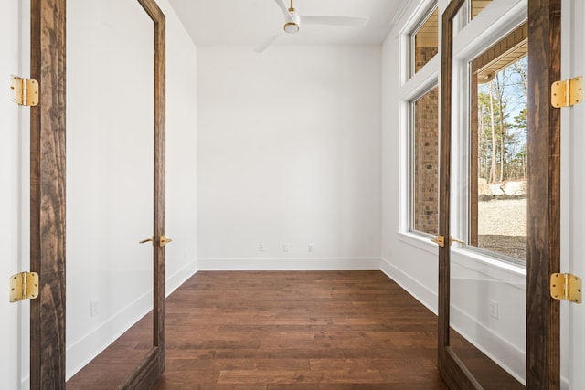 empty room with dark hardwood / wood-style floors