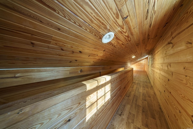 details with wood walls and wooden ceiling