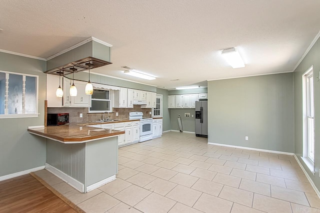 kitchen featuring white cabinetry, stainless steel fridge with ice dispenser, white range with electric cooktop, kitchen peninsula, and decorative light fixtures