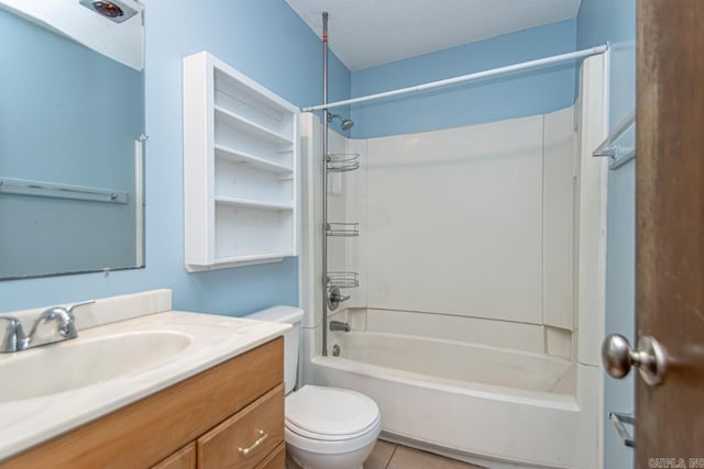 full bathroom featuring tile patterned floors, shower / bathtub combination, vanity, a textured ceiling, and toilet