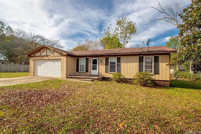 ranch-style house with a garage and a front yard