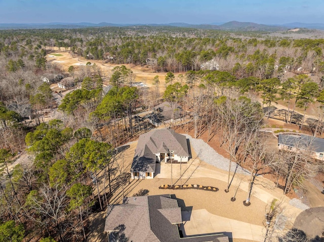 birds eye view of property featuring a mountain view