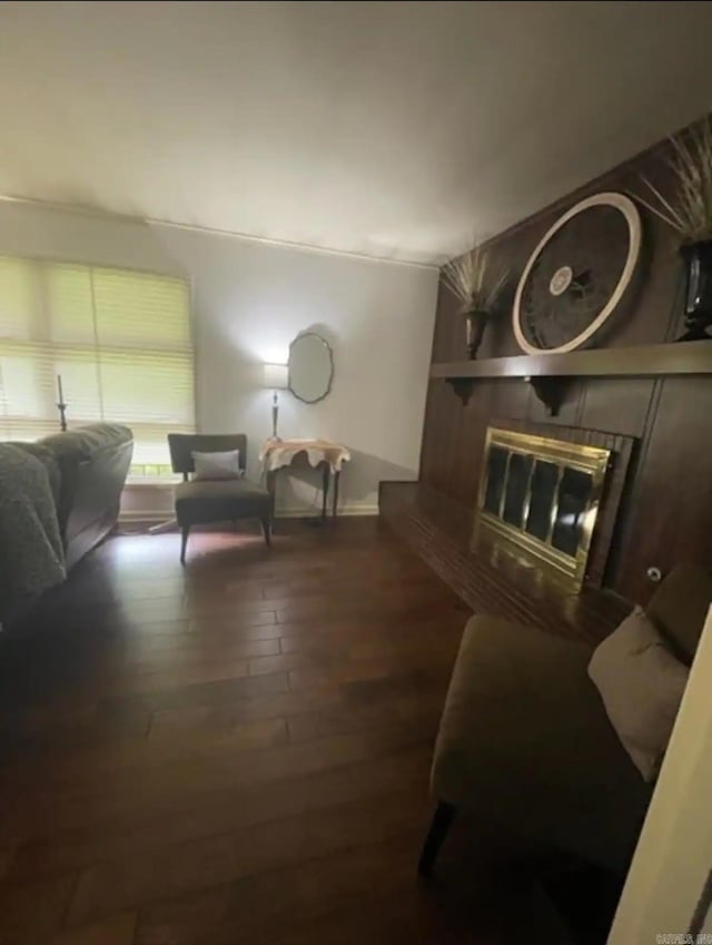 living room featuring dark hardwood / wood-style floors and vaulted ceiling