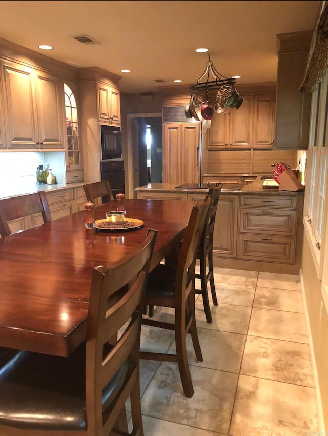 view of tiled dining room