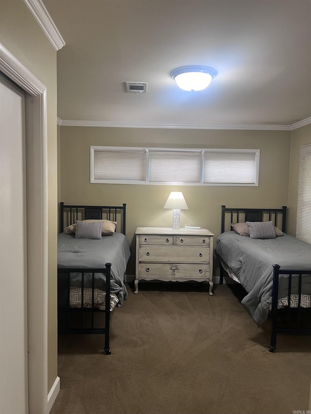 carpeted bedroom featuring ornamental molding