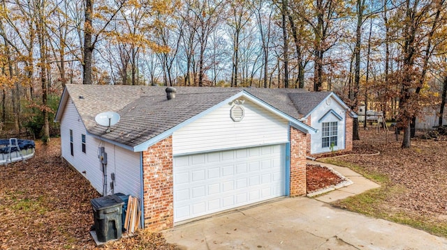 ranch-style house featuring a garage