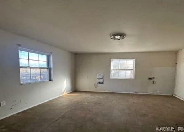 empty room featuring carpet flooring