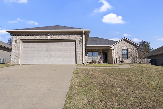 view of front of house with a garage and a front yard