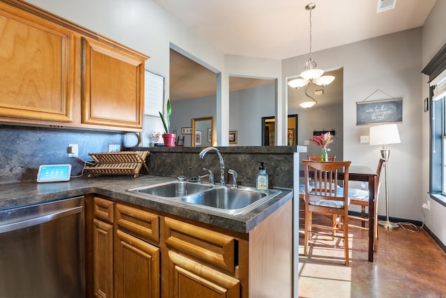 kitchen featuring tasteful backsplash, stainless steel dishwasher, sink, pendant lighting, and a chandelier