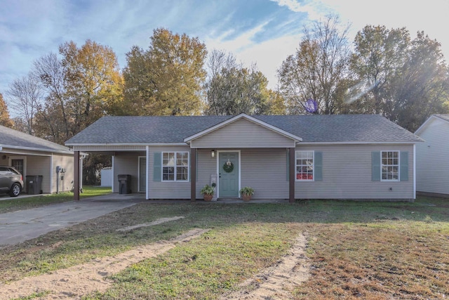 single story home with a front lawn and a carport