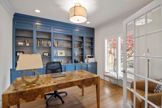 home office with french doors, hardwood / wood-style flooring, and ornamental molding