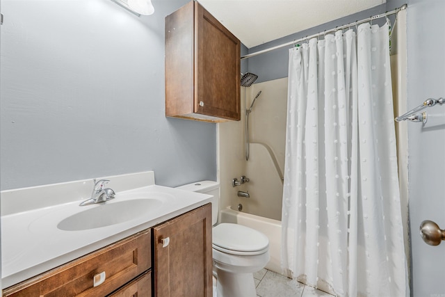 full bathroom featuring tile patterned flooring, vanity, shower / bath combo, and toilet