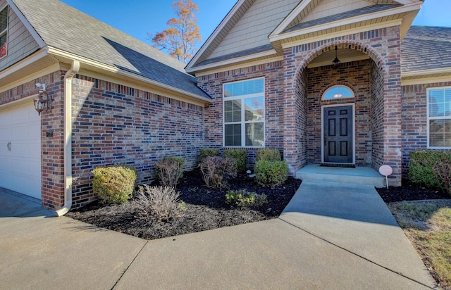 entrance to property with a garage