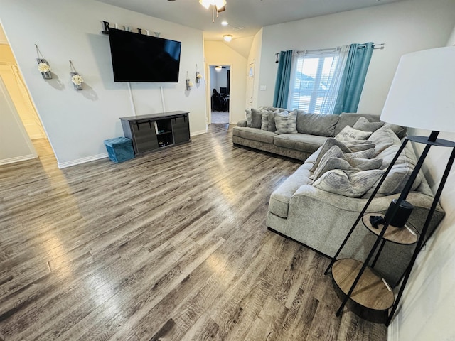 living room with ceiling fan and wood-type flooring