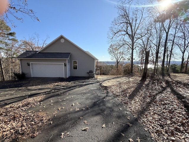 view of home's exterior featuring a garage