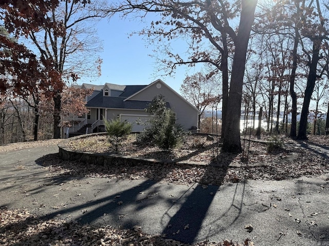 view of side of property with a garage