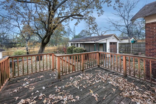 deck featuring an outdoor structure