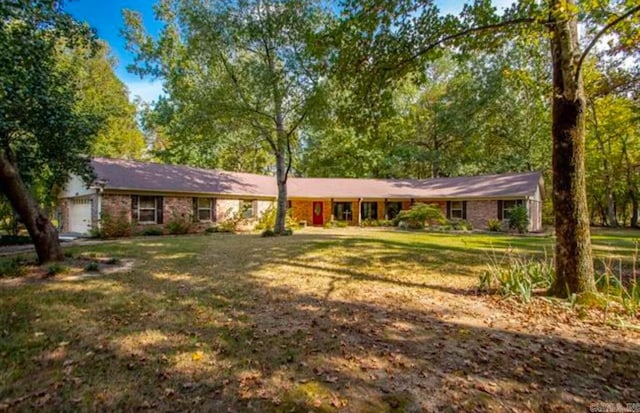 single story home with a garage