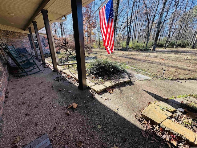 view of yard with a porch