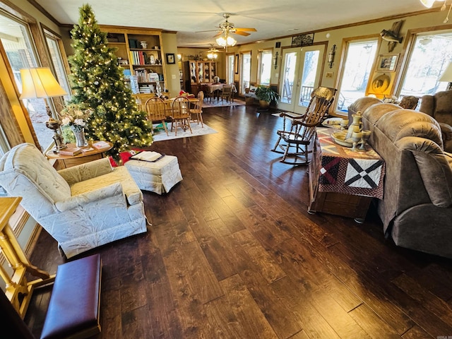 living room with ceiling fan, dark hardwood / wood-style flooring, and crown molding