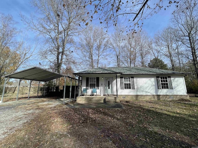 view of front of home featuring a porch and a carport