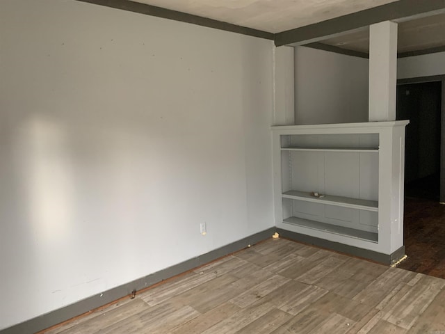 spare room featuring hardwood / wood-style floors