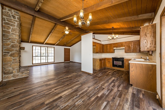 kitchen with vaulted ceiling with beams, black electric range, and pendant lighting